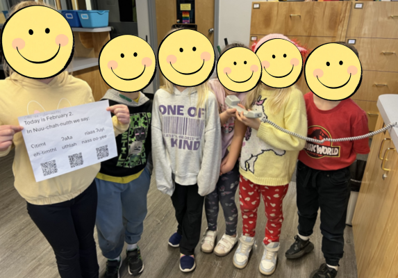 A group of students after doing their weekly announcements